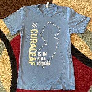 Curaleaf shirt is in full bloom